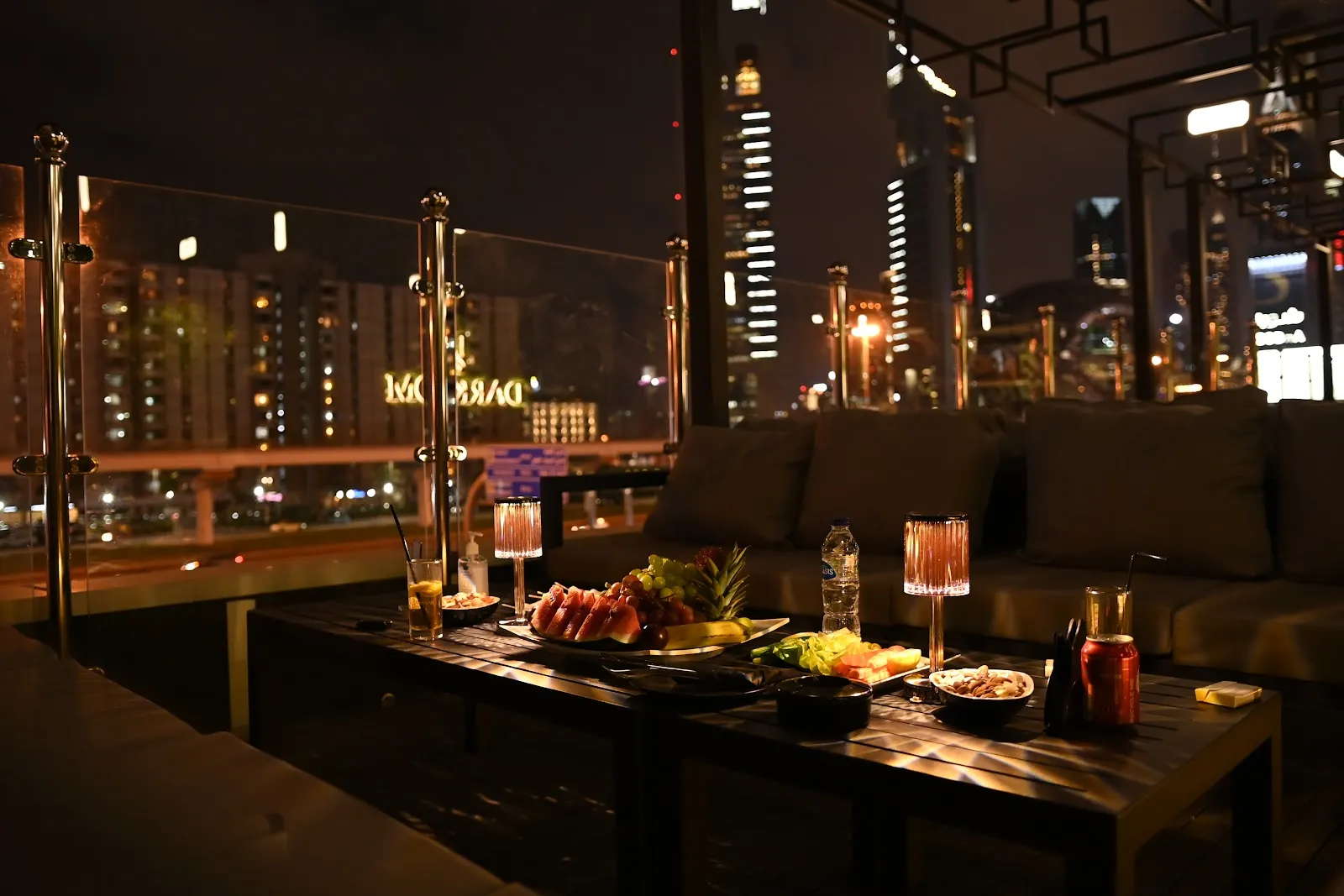 Outdoor terrace seating with Sheikh Zayed Road skyline views at Dark Room Dubai Night Club